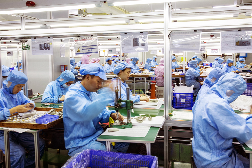 Workers inspecting products in the workshop
